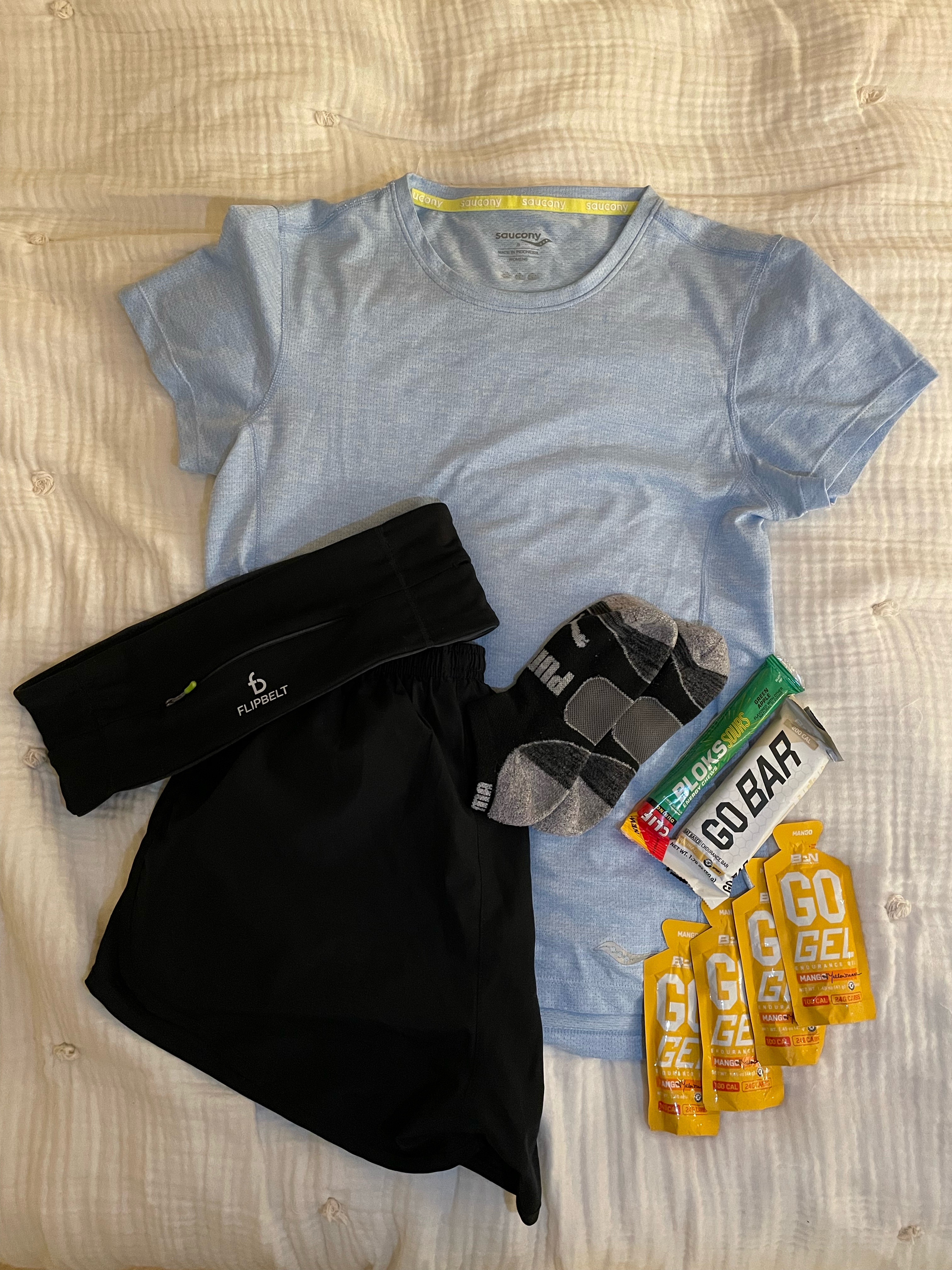 Flat lay of my running gear and fuel